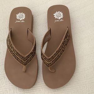 Yellow box flip flops size 8.5